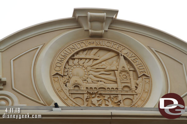 A closer look at the seal for Mickey Avenue atop the entrance.