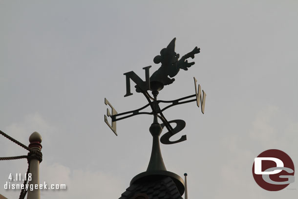 A weather vane atop the building.