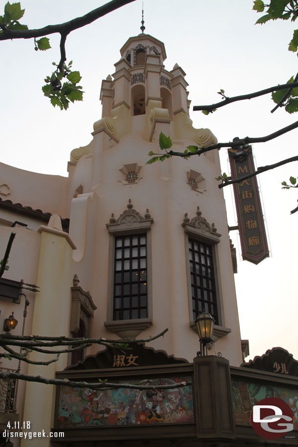 The far entrance to the store is under a replica of the Carthay Circle Theater tower.