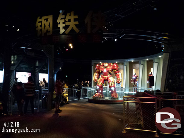 Several Ironman suits on display.