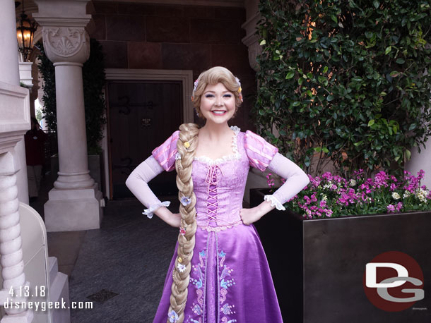 Rapunzel was outside the Storybook Court and waving good morning to guests.