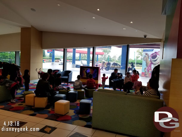 A waiting area inside the lobby with a view of the entrance way.