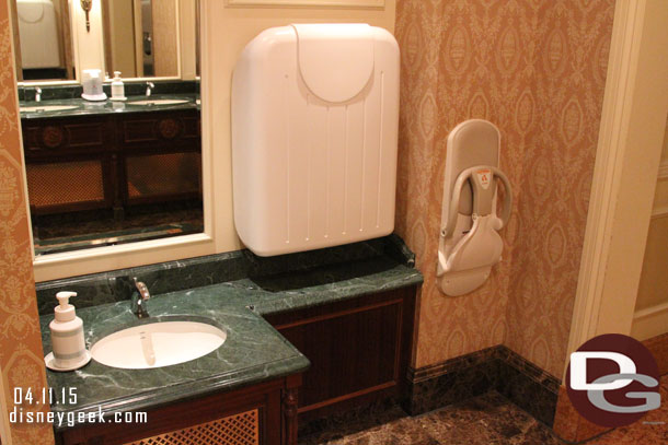 A changing table area in the mens room