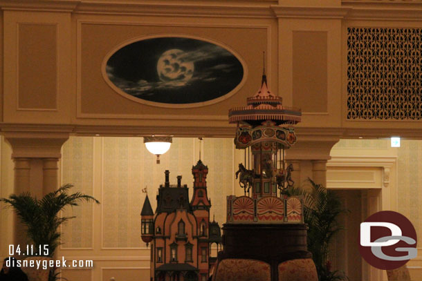 A model house and carousel in the lobby.