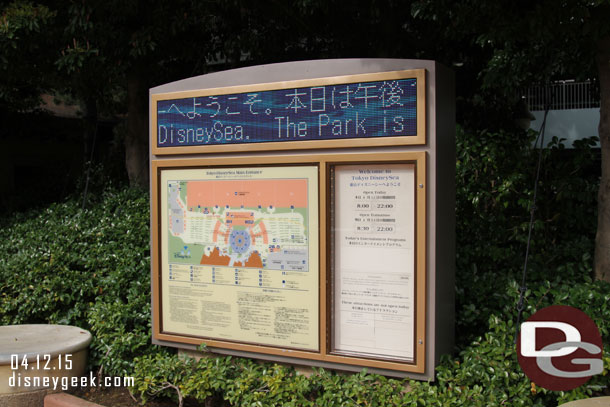 An information board with a map, operating times, etc..