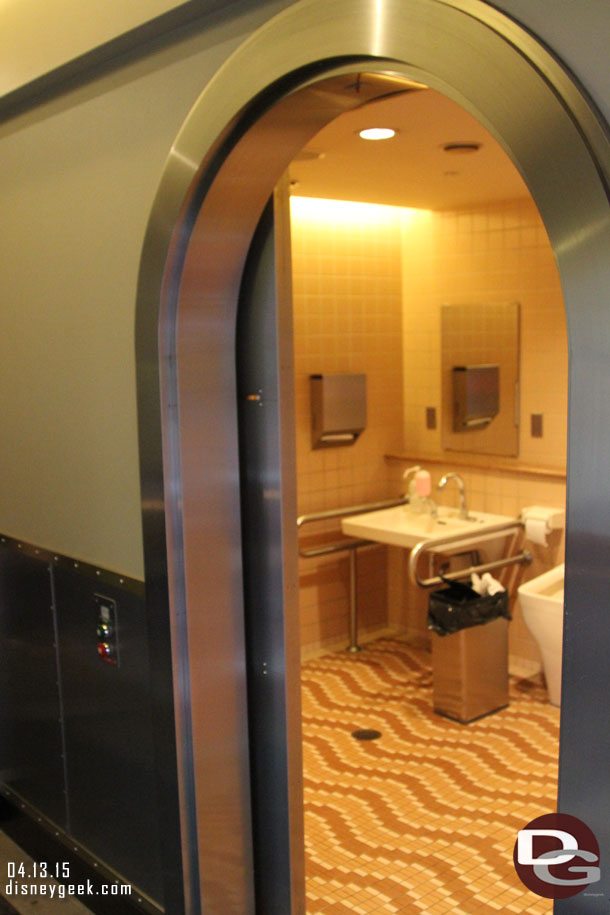 The companion bathroom had a sliding pocket door with push buttons (on the left).