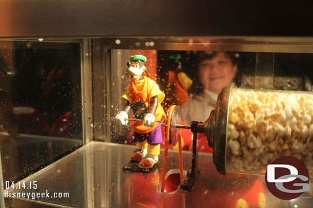 Goofy working the popcorn cart