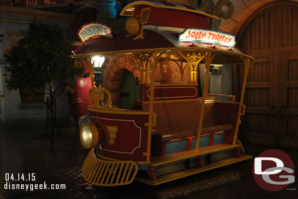 The Jolly Trolley is parked as a photo op.  It lights up.  I do not think the Anaheim one does.. I will have to check now.