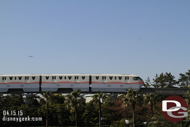 A Monorail cruising by toward Disneyland.