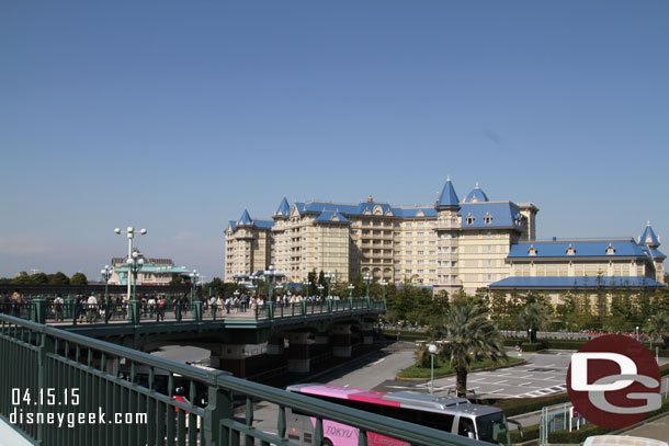 We decided since we were halfway there and had 15 minutes until opening to walk to the park.  The walkway on the left and the Disneyland Hotel ahead.