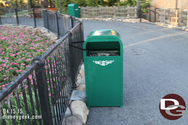 Here Trashcans were tied to the fences.