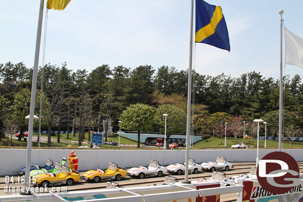 Some cars in the pit/off the track.