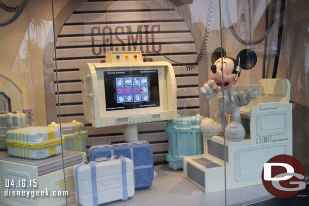 Heading toward Tomorrowland. A store window.