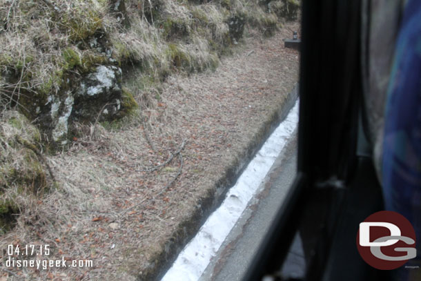 The first sight of snow along the road.