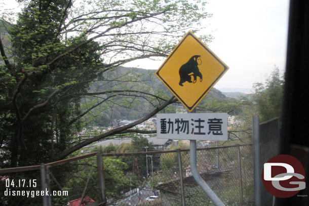 Thought this was an interesting sign.  Can anyone translate for me?  Assuming it does not mean monkey crossing.