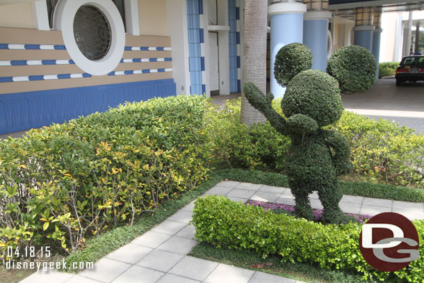 Mickey topiary out front.