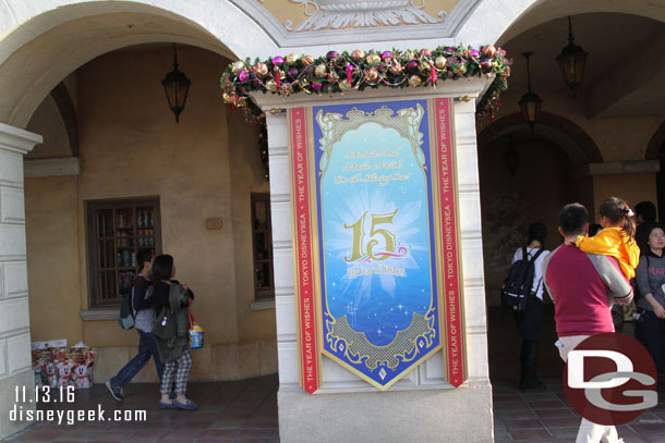 A 15th Anniversary Banner with Christmas decorations.