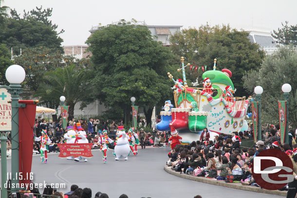 The Disney Christmas Stories parade making its way into the central plaza.