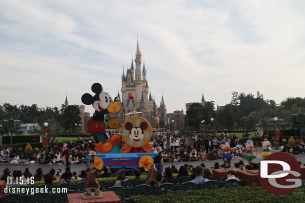 Mickey passing Cinderella Castle.