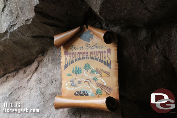 A sign for the Explorer Canoes along the walkway.