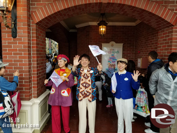 Cast Members Greeting everyone.  There were a lot of Cast Members out with flags and they were all having a great time.