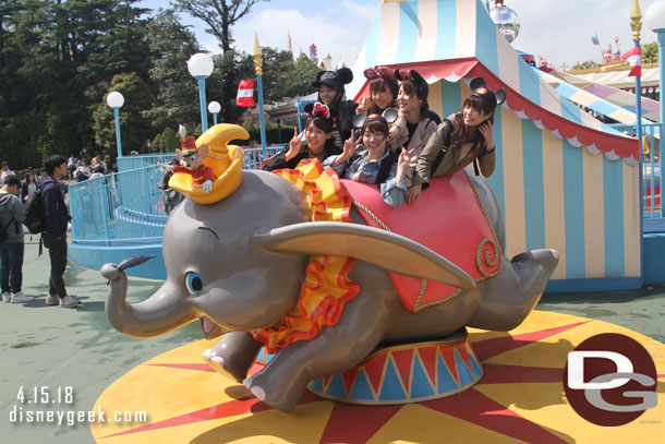 If you were ever curious how many people can fit into a Dumbo for a photo op.. this group managed six, sort of.