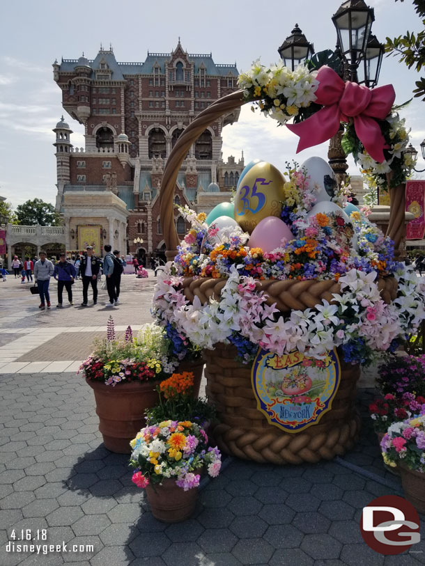 Large Easter baskets flank the walkway.