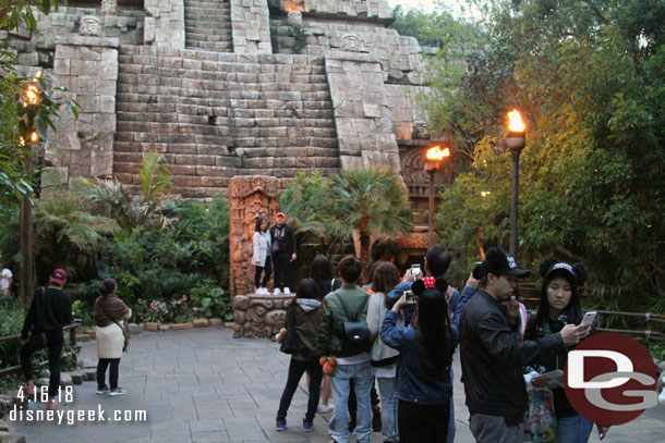 A line for this unique photo op where you are encouraged (or at least not discouraged) from climbing on something in front of the Indiana Jones Temple.