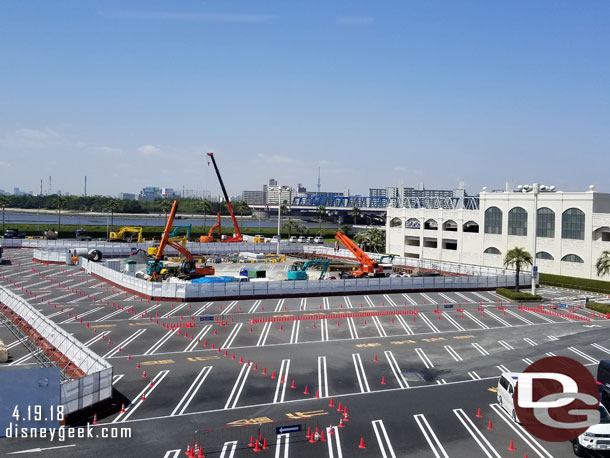 Work underway in the Tokyo Disneyland parking lot. Assuming this is for the new parking structure.