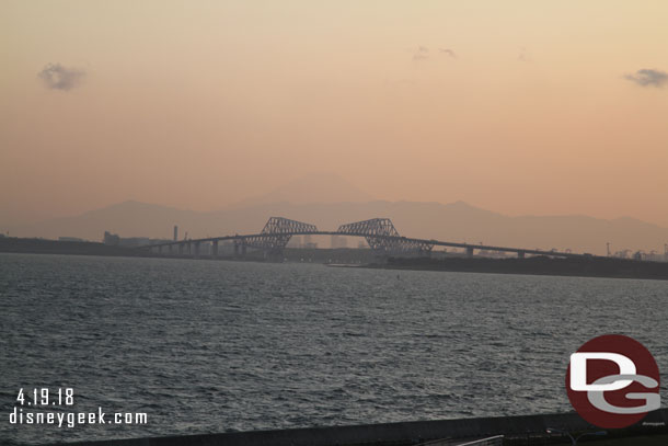 You can just barely make out the outline for Mt. Fuji in the distance beyond the bridge.