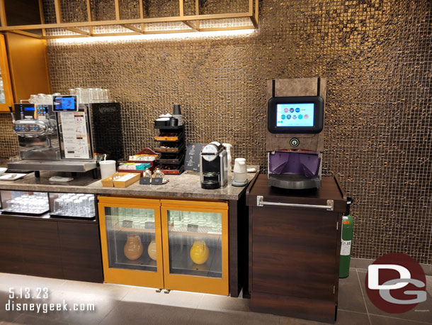 The drink area included a selection of Coke products, coffee, and juices.