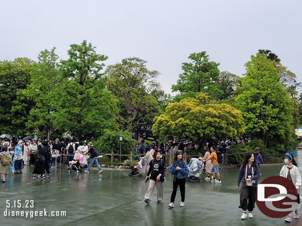 To the left is the queue for Pooh's Hunny Hunt.  If you were hoping B&B and Baymax would draw all the guests and Pooh would be shorter, that does not seem the case.