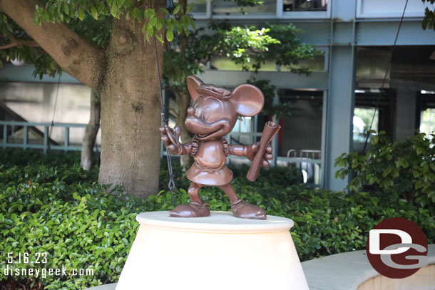 Mickey between the parking structure and park entrance.