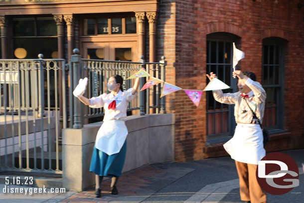 Cast Members with Dream Garland waving to guests