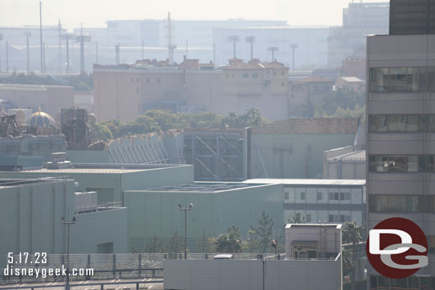 The large building in the distance is Soaring Fantastic Flight. The top portion has details because it is visible from inside the park.