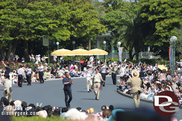 2:09pm - A group of cast members leading the way and warming up the parade.