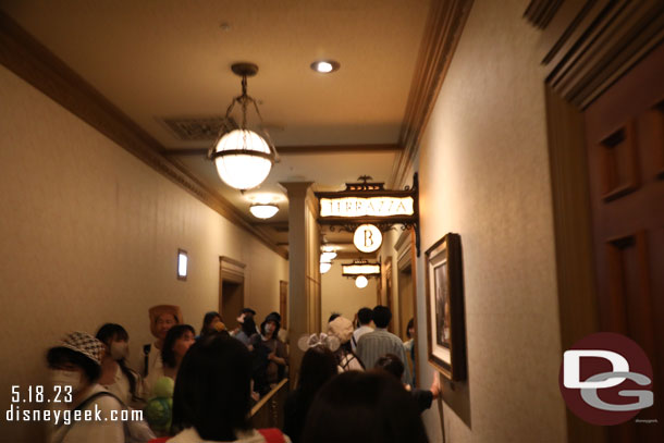 After the pre-show you are sent down a hallway and this is where you are grouped into for the attraction. There are three rooms and then three rows in each room.