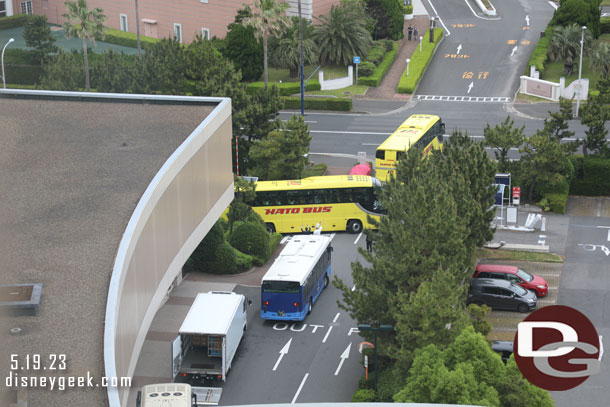 Buses loaded up and departing the hotel.