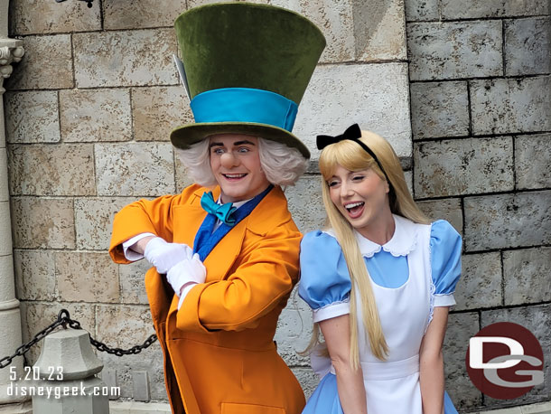 Alice and the Mad Hatter in Fantasyland