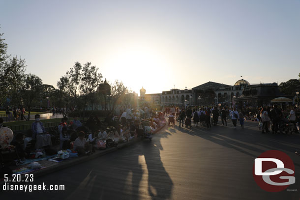 5:56pm - Guests lining the street as the sun sets waiting for the Tokyo Disneyland Electrical Parade Dreamlights