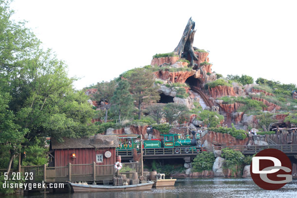 Western River Railroad train passing Splash Mountain