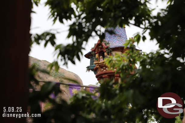 Through the trees you can get a glimpse of the tower.