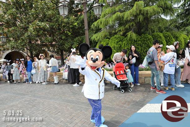Mickey was arriving to meet guests and walked along side of me for a bit.