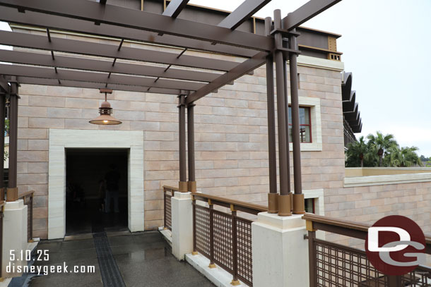 A portion of the walkway is not covered. 