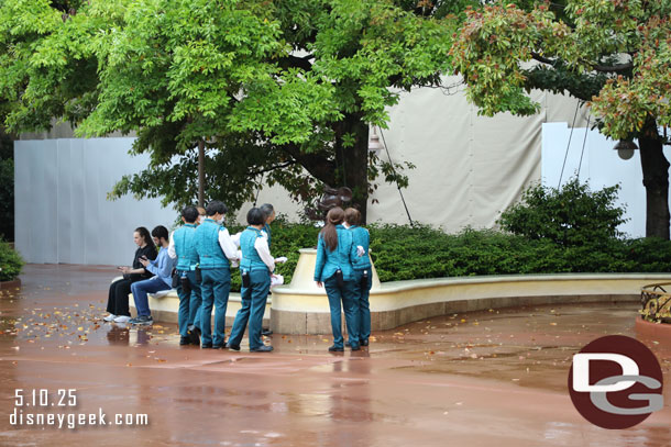 Not sure what was going on here but a number of cast members taking turns drying the Mickey Statue.