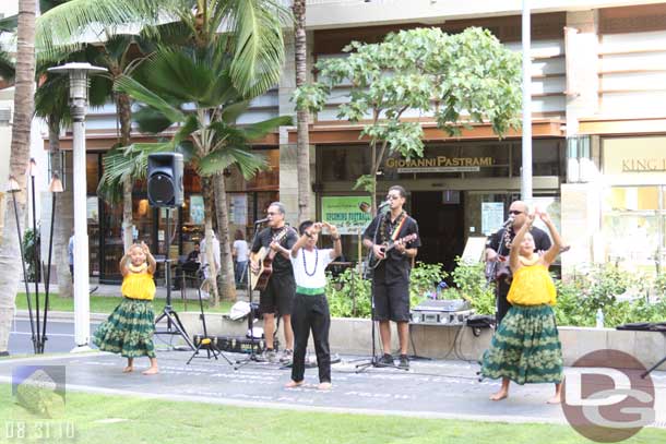 A band and dancers near the hotel.