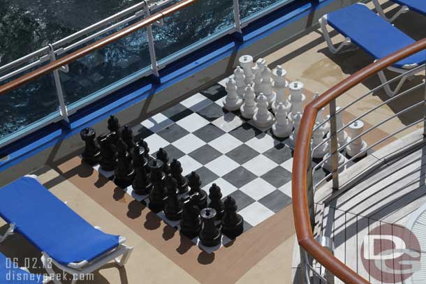 A large chess set out on deck.