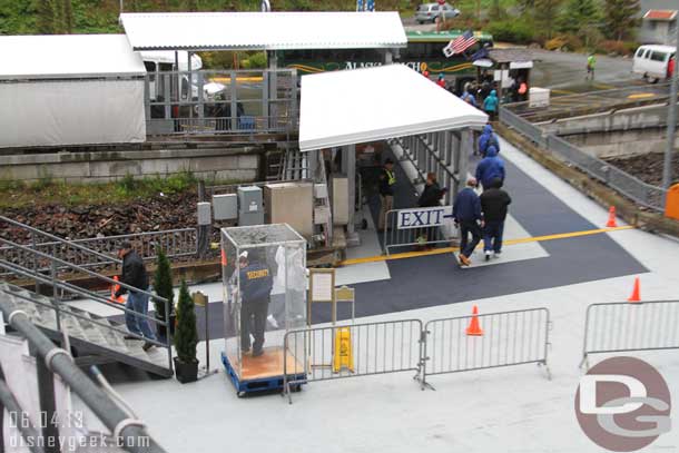 Time to head ashore.  I like how the security person has a box to stand in to get out of the rain/wind.