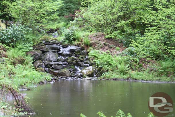 A retaining bond and water fall that are used to slow the stream down as it makes its way down the mountain.