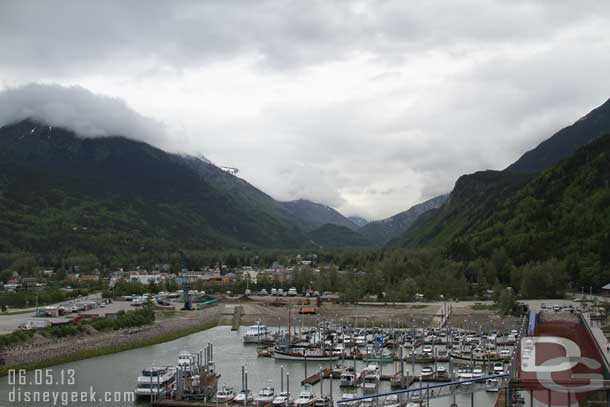 Looking out the front of the ship.  A small harbor and beyond it Skagway and then the mountains.